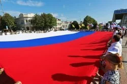 Российский флаг с американского континента привезли в Крым